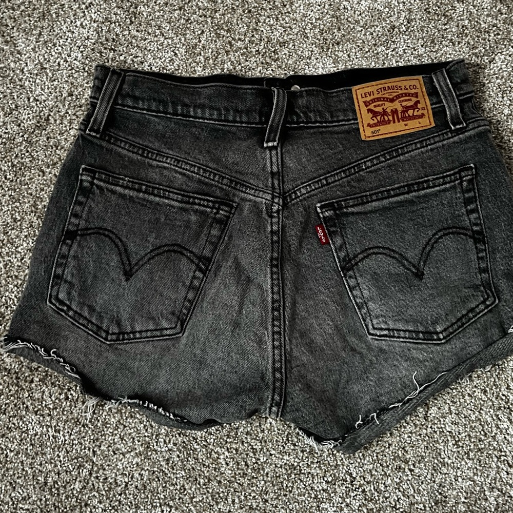 Grey /black levi shorts with multi button in the front. (no zipper) WORN 2X